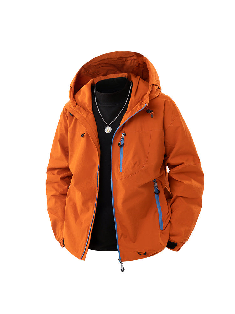 Load image into Gallery viewer, Men's corduroy jacket in sunset orange – trail lifestyle shot